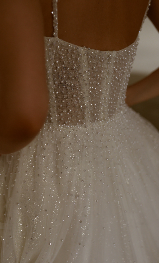 Covered in decadent pearls and crystals, Enya has a luxe feel 