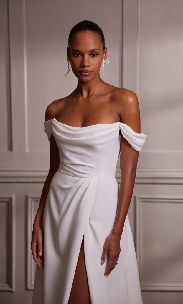 The gown offers a perfect blend of modern sophistication and traditional charm 