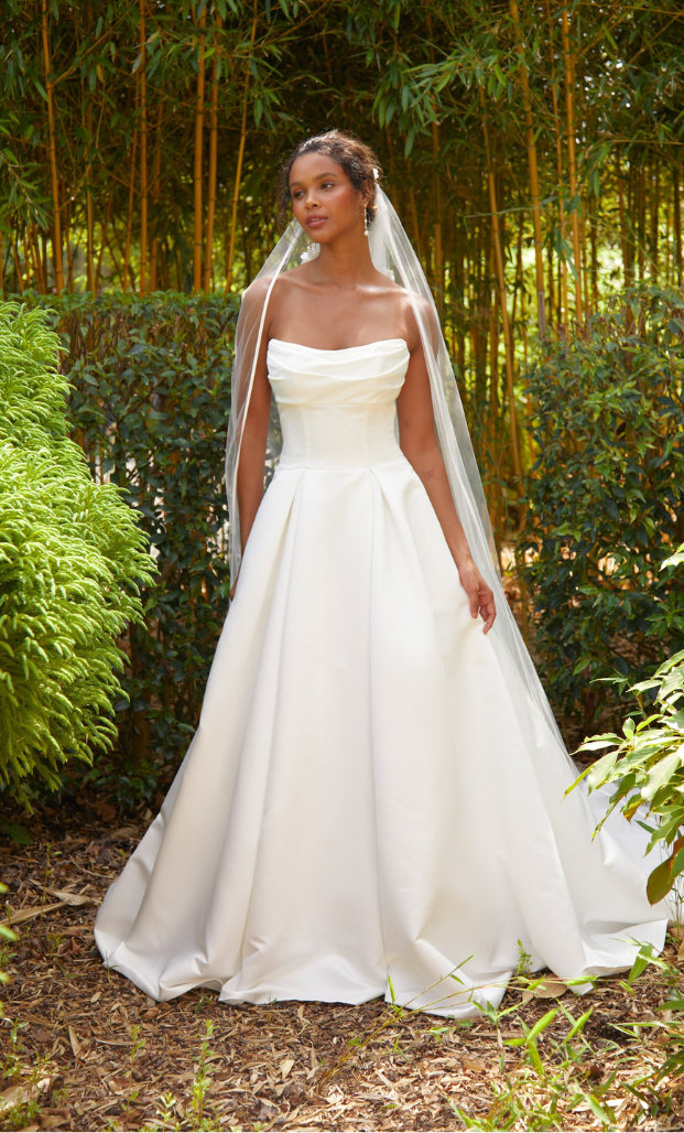 Michaela is a sleek and contemporary satin ballgown