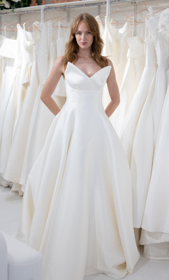 Trend One: We adore the architectural neckline of this Freda Bennet gown 