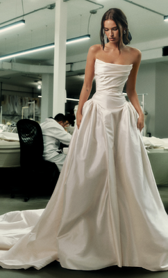Eloise has a voluminous skirt with minimalist lines