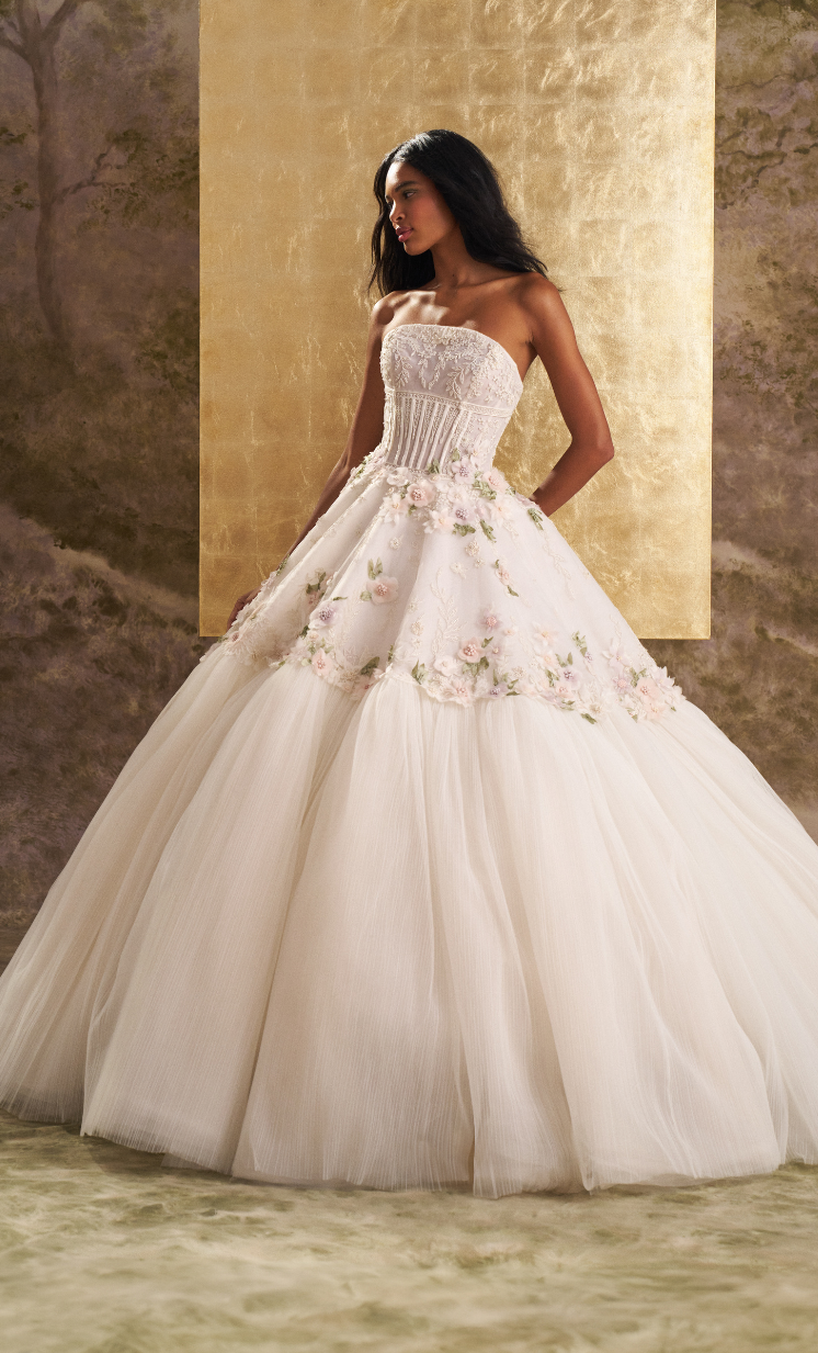 Visible corsetry and textural floral details 