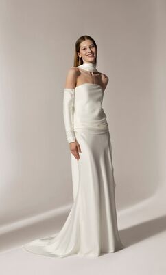 Accessorised to perfection: Minimalist gown with detachable sleeves and neck scarf