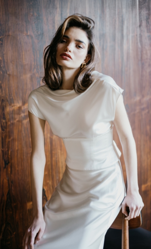 Minimal draping with a softly structured waist Minimal draping with a softly structured waist