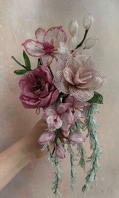 Handcrafted glass-beaded blooms created by Hannah of The Beaded Florist